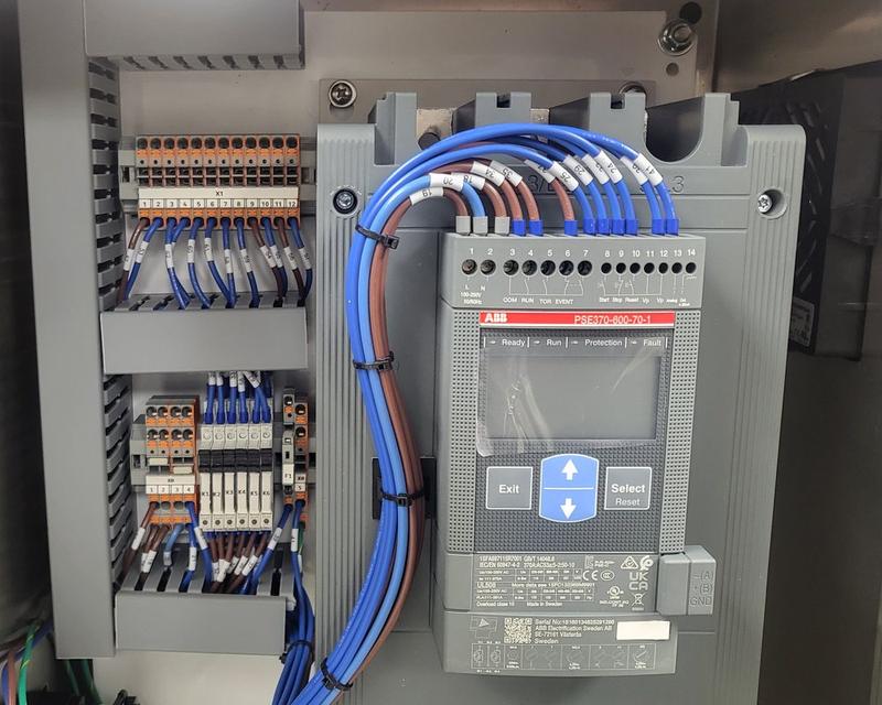 Marine control enclosure with soft starter, interior